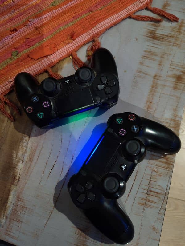 PS4 Slim (500GB) 2 controllers 7 Games urgent sale 3