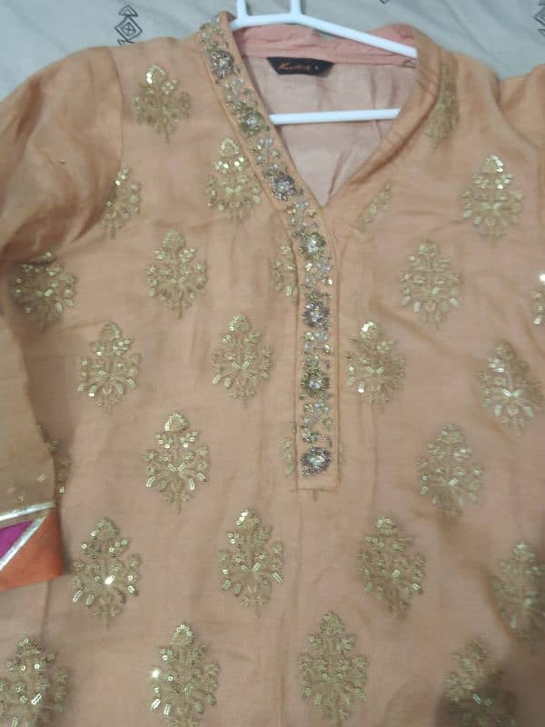 golden orange suit medium size 10