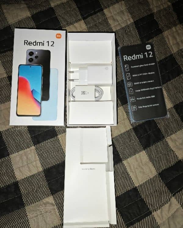 Redmi 12 with complete box under warranty 2