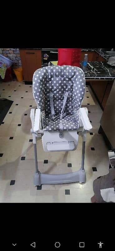 tinnies high chair. . . 0