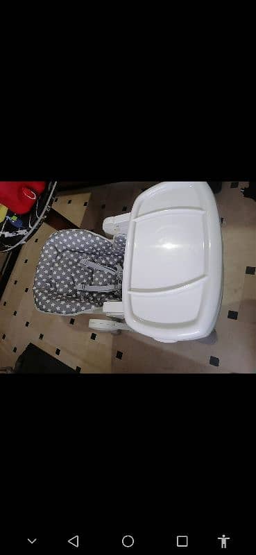 tinnies high chair. . . 1