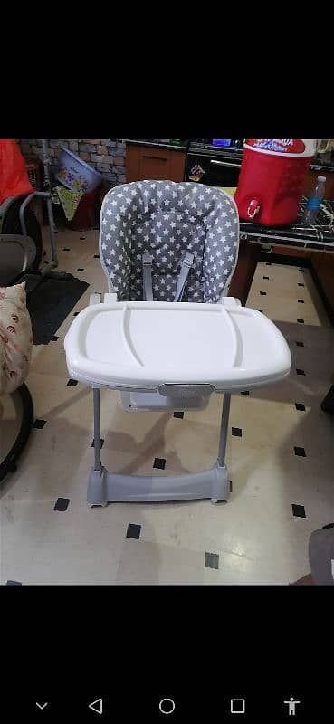 tinnies high chair. . . 2