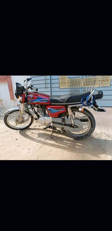 Honda 125  model 2021 Islamabad golden Numbers own my name urgent sale 2