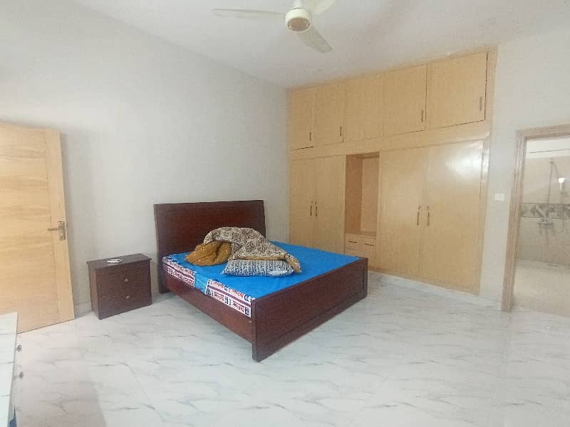 F-7/2. One Kanal Fully Furnished Upper. Portion Separate Gate Big Garden Tiles Flooring Near Rana Market Ideal Location. rent 1500 dollar. 35