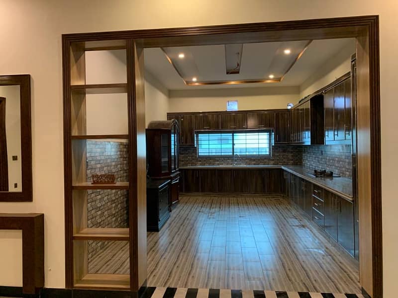 10 Marla 5 Bed Tile Floor Double Storey House In Wapda Town F-2 Block 1