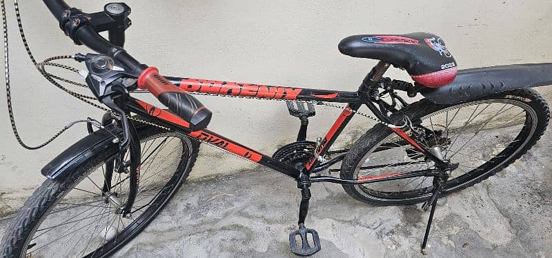 Phoenix Red Coloured Bicycle in Good Condition 0