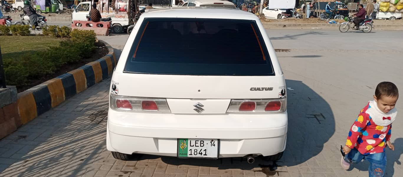 Cultus 2014 model, Lahore registered, white colour 8