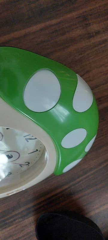 Almost new condition, wall clock with rotating eyes as pendulum 1