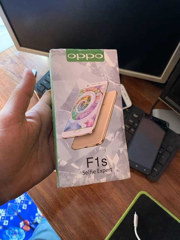 Oppo f1s with box 1