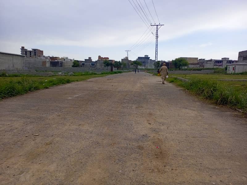 7 marla carnor plot available for sale prime location paris city f block carpets road water electricity available sewerage underground near nust double road 2