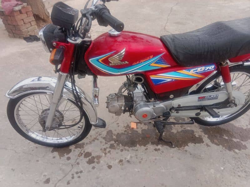 Honda cd 70 2019 with golden number 1