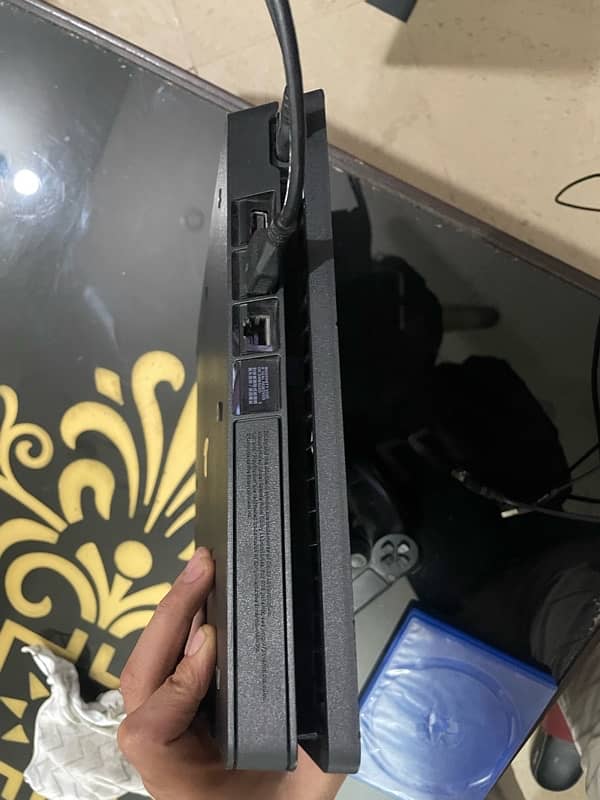 PS4 Slim 500gb with 3 controllers and gta 5 disc 4