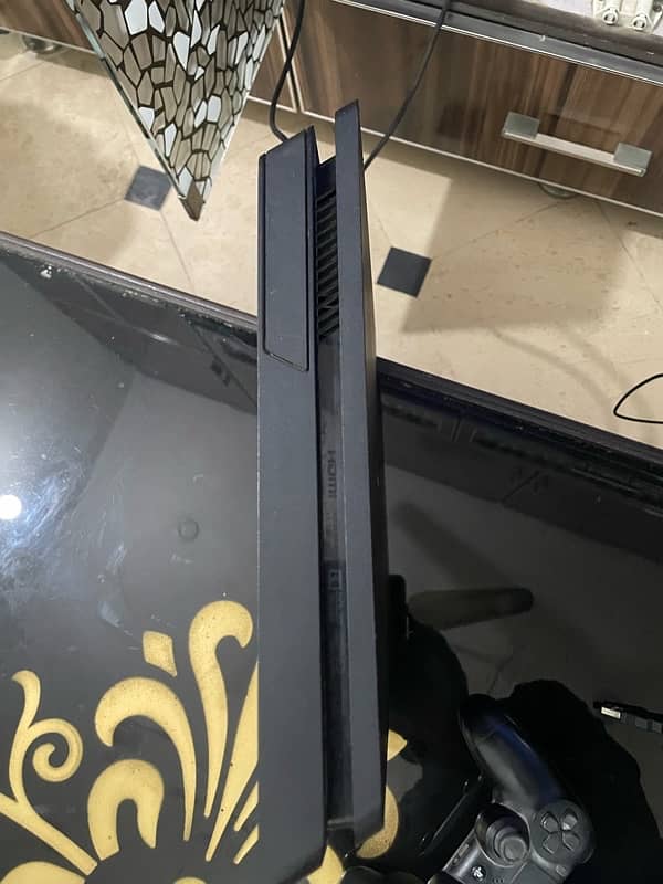 PS4 Slim 500gb with 3 controllers and gta 5 disc 5