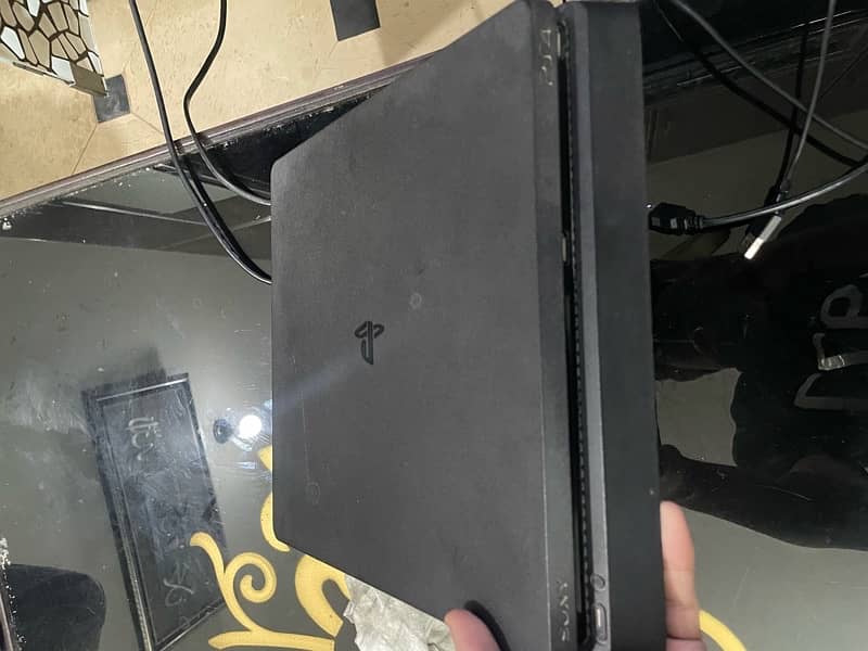 PS4 Slim 500gb with 3 controllers and gta 5 disc 7