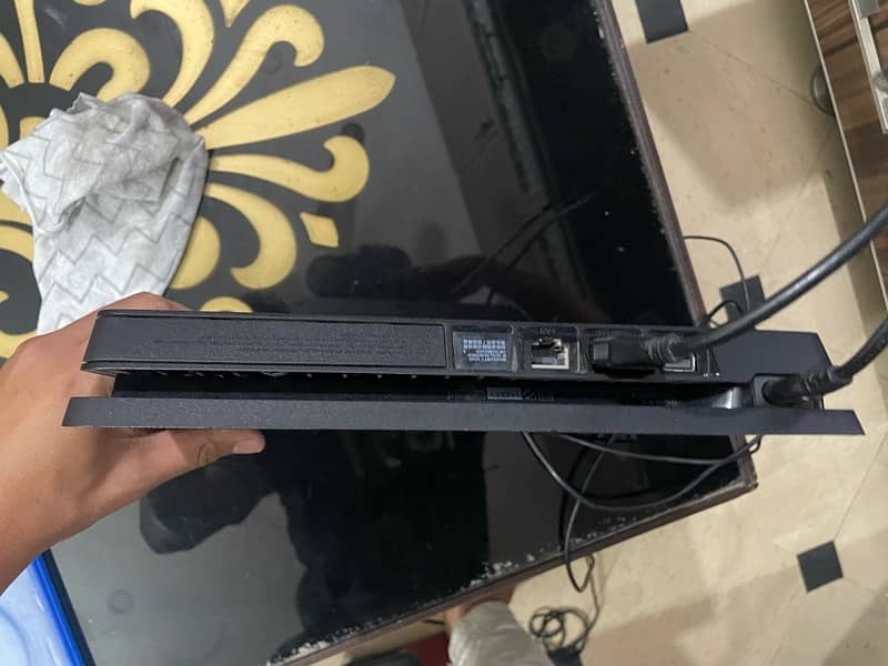 PS4 Slim 500gb with 3 controllers and gta 5 disc 11