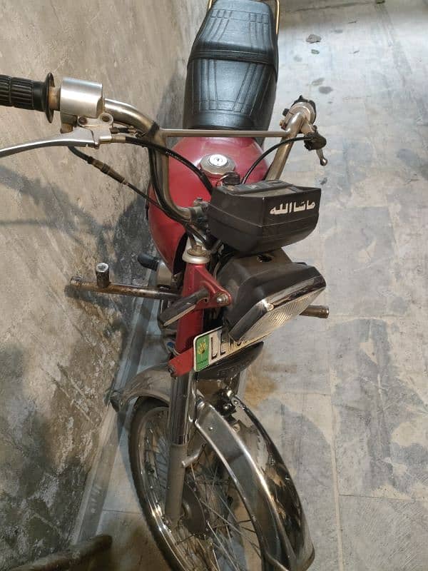 Honda CD 70 red color 1