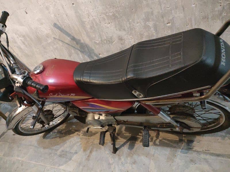 Honda CD 70 red color 3