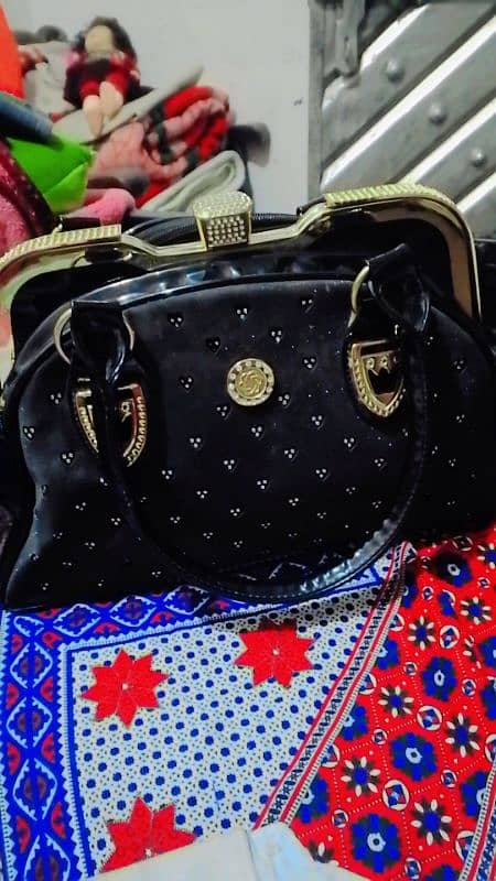 A Black hand bag for sell. 3