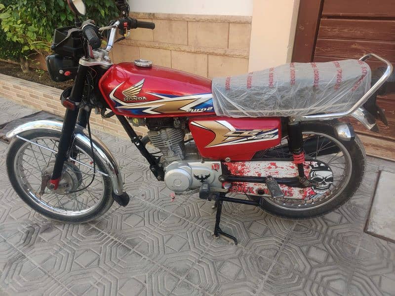 Honda 125 model 2020 karachi number first owner 1