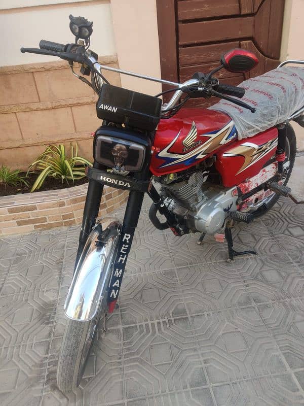 Honda 125 model 2020 karachi number first owner 2