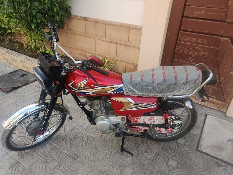 Honda 125 model 2020 karachi number first owner 6