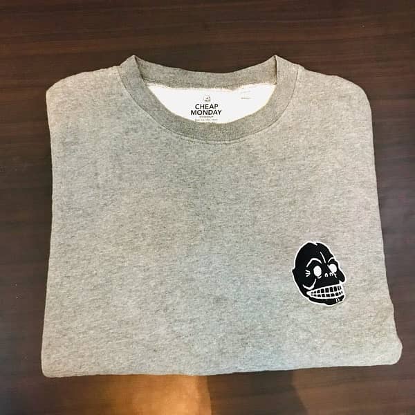 A Grey Sweat-Shiry with Anime Logo 0