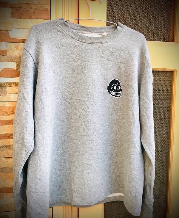 A Grey Sweat-Shiry with Anime Logo 1