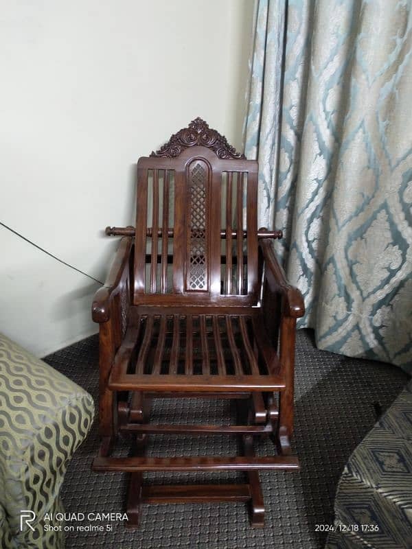 pure shisham rocking chair very good condition 0