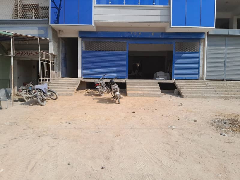 MAIN 200 FEET ROAD FACEING SHOP FOR RENT IN GULISTAN-E-JAUHAR BLOCL 9 PIA SOCITEY 7