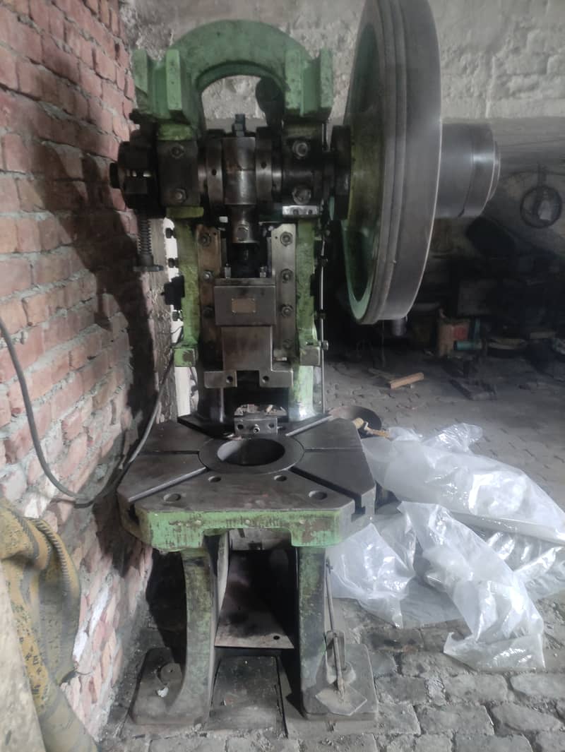 Surfacer grinder , press 2