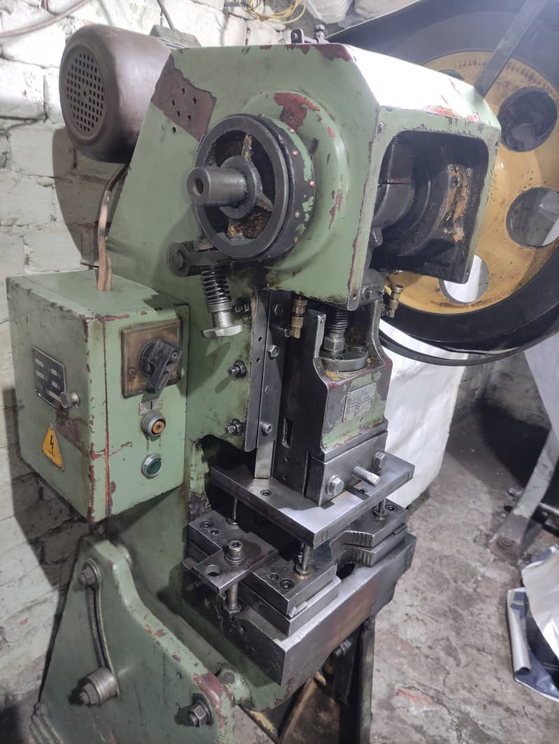 Surfacer grinder , press 8