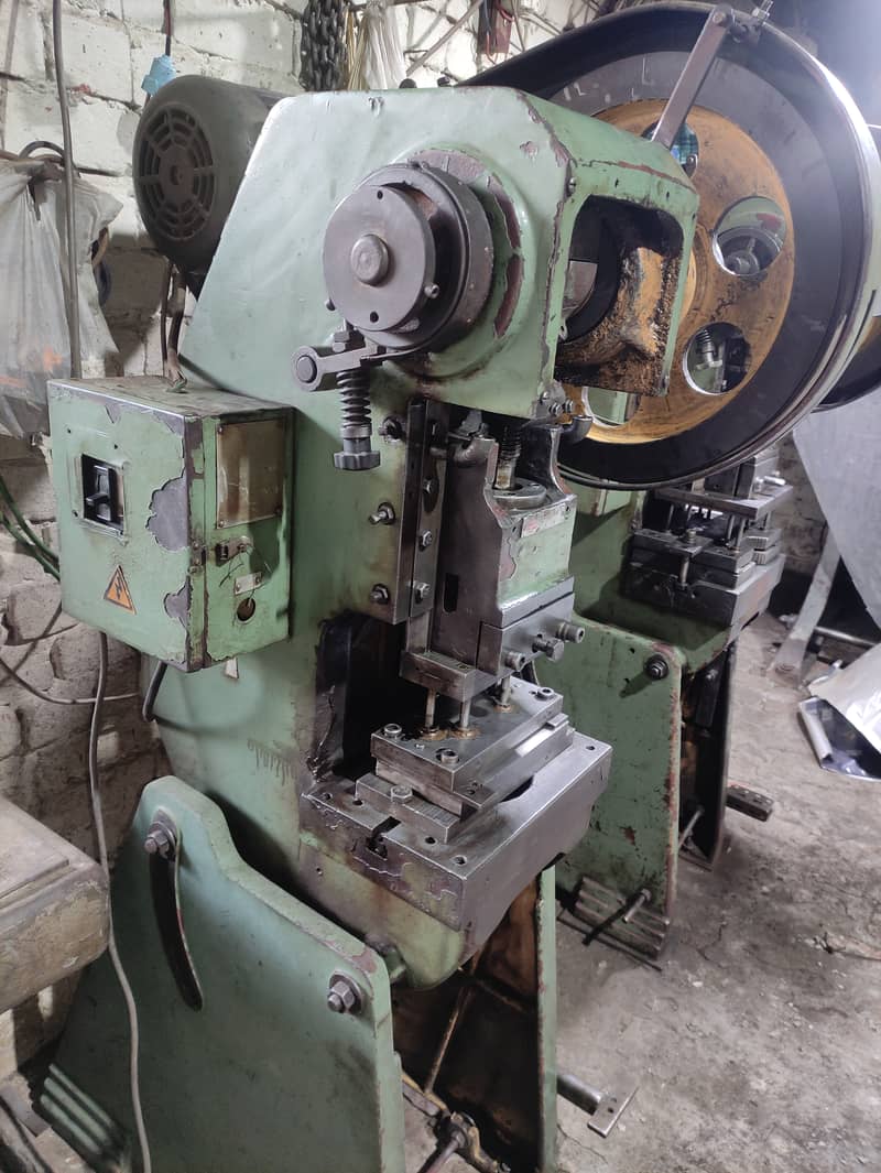 Surfacer grinder , press 11