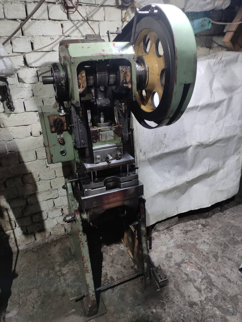 Surfacer grinder , press 12