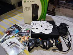 Xbox360 250gb with two controllers and 9 games