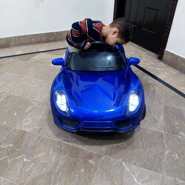 baby - kids car , remote controlled, new battery, new adaptor. 0