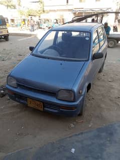 Daihatsu Cuore 1993 660cc petrol average 250bike 100% for best yango