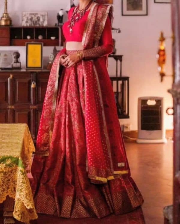 Red lehnga bridal by Gol Mohar 0