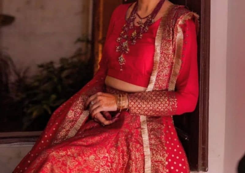 Red lehnga bridal by Gol Mohar 1