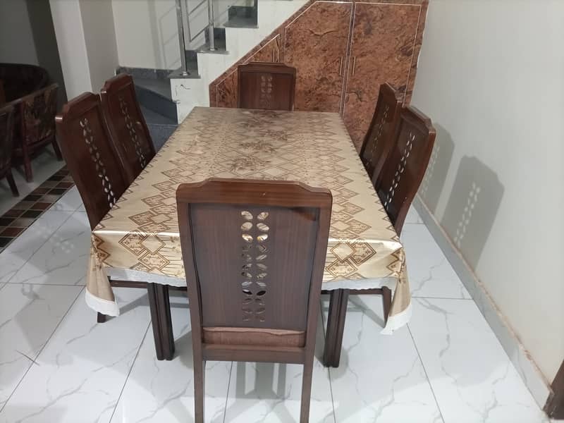 6 chairs dining table 2 in 1 (glass and wood) 2