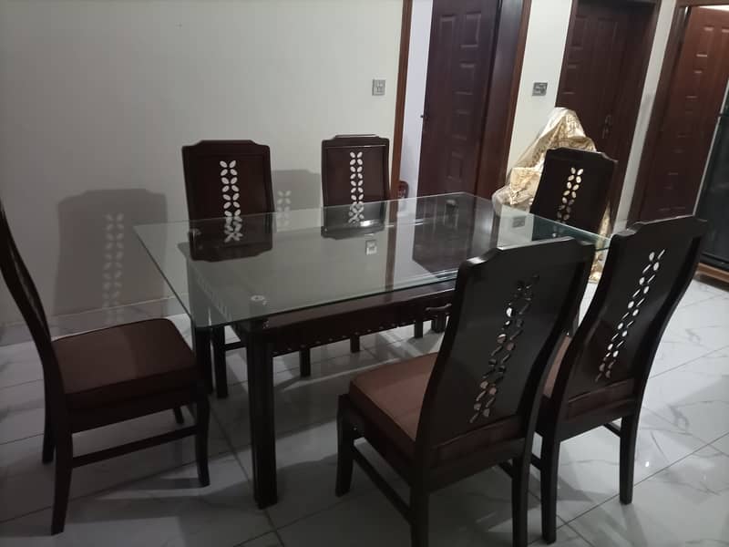 6 chairs dining table 2 in 1 (glass and wood) 3