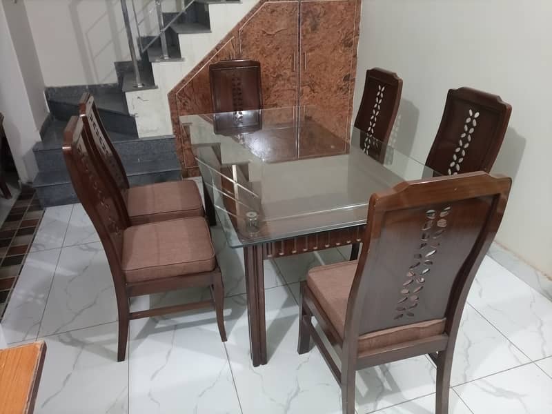 6 chairs dining table 2 in 1 (glass and wood) 4