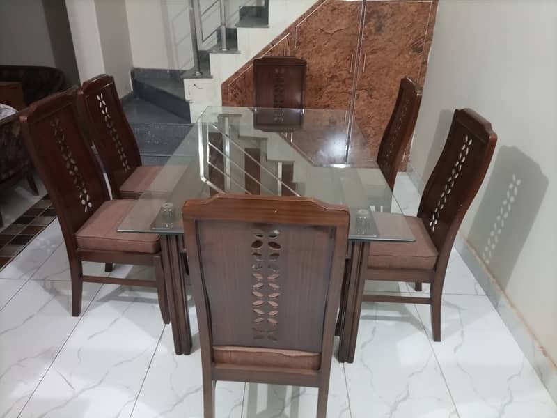 6 chairs dining table 2 in 1 (glass and wood) 5