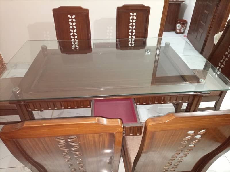 6 chairs dining table 2 in 1 (glass and wood) 6