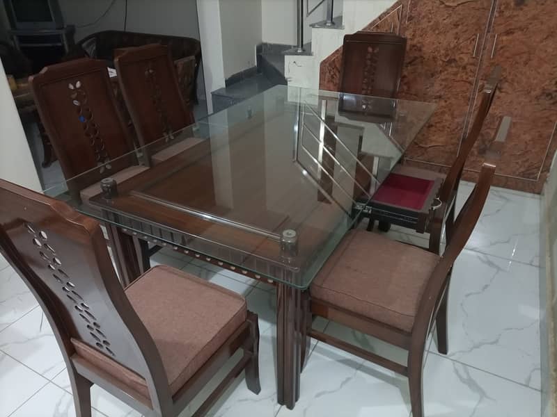 6 chairs dining table 2 in 1 (glass and wood) 8