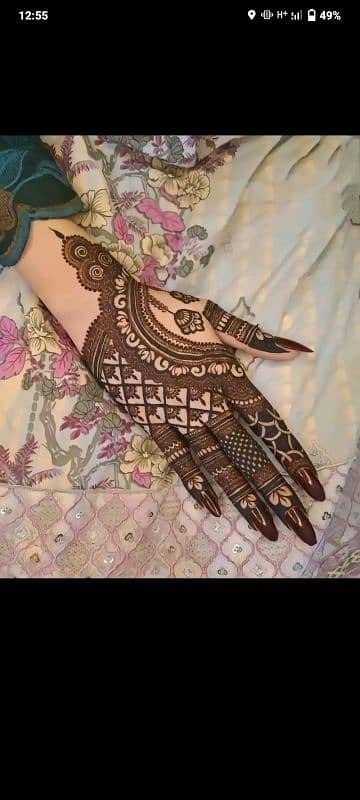 female mehndi expert and hairs expert also make-up. 1