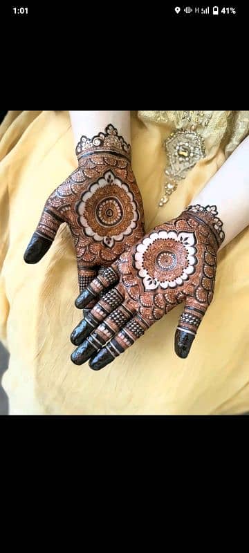 female mehndi expert and hairs expert also make-up. 3