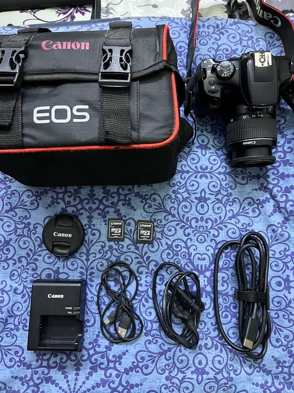 CANON EOS 1300d DSLR CAMERA WITH 18/55mm LENSE CONDITION 10/09 1