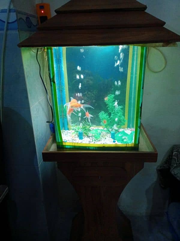 aquarium stand with aquarium 4 gold fishes 03105617360 3