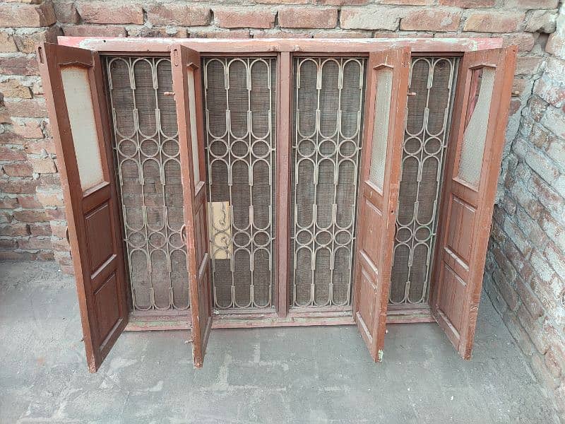 Wood Window with Iron Grill  5 x 4 ft 0