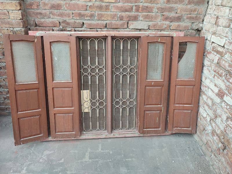 Wood Window with Iron Grill  5 x 4 ft 1